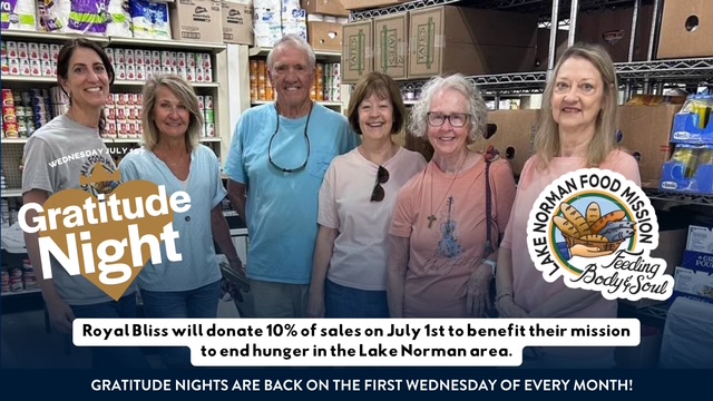Lake Norman Food Mission volunteers standing together in the food pantry